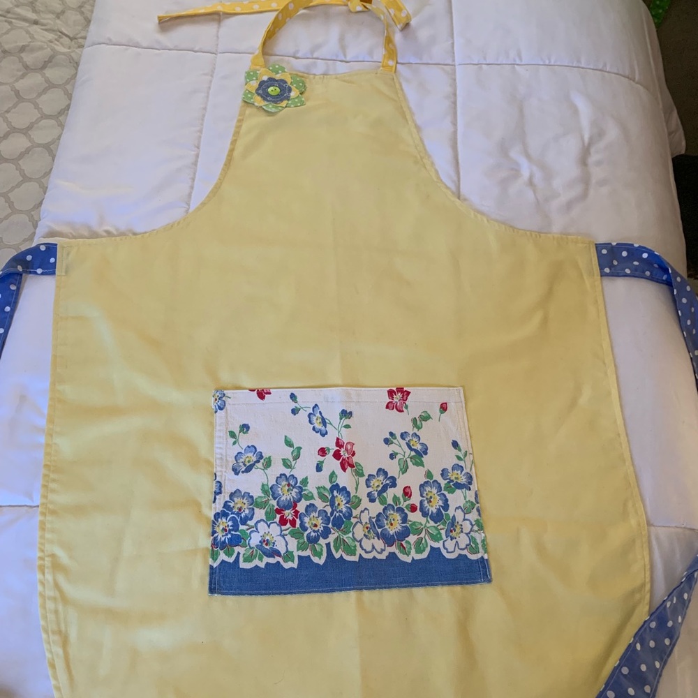Vintage pillowcase apron in yellow.